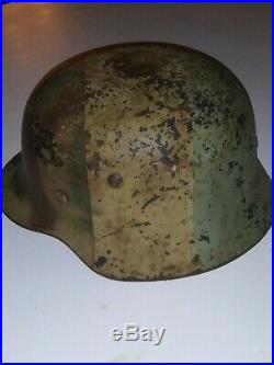 Authentic m35 Et66 Tri Color Ww2 German Millitary Helmet all original. Full name