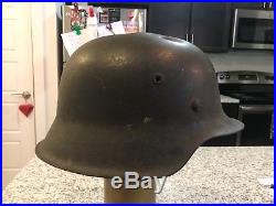 German WW2 battle damaged M42 SD heer helmet stunning
