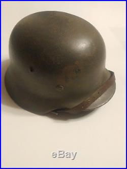 German World War 2 M35 painted former tropical helmet