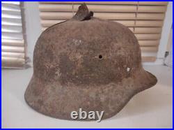 German helmet with shrapnel wound. Wehrmacht 1936-1945 WWII WW2