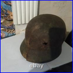 German original. German M-35 helmet with stamps on the rim of the liner. WW2