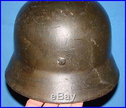 NICE WW2 GERMAN M-35 RE-ISSUED HELMET WITH CAMOUFLAGE PAINT
