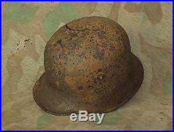 Original WW2 Relic German Steel Helmet M16 type (from Kurland) Battle Damage