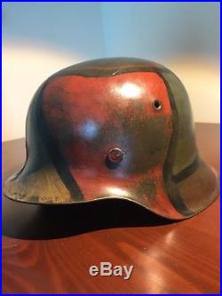 Original WW2 german helmet with ww1 camo pattern, liner, and chinstrap size 56