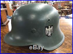 Original vintage World War II WW2 GERMAN ARMY HELMET with Camouflage Paint