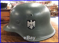 Original vintage World War II WW2 GERMAN ARMY HELMET with Camouflage Paint