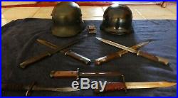 WW2 GERMAN HELMETS, 7 bayonets & belt buckle. $799 including shipping