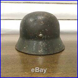 WW2 German Helmet M35 Wehrmacht Stahlhelm in original camo coat