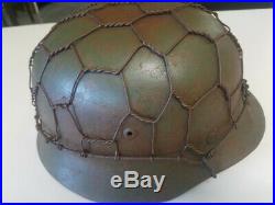 WW2 German Helmet M35 original with half wire basket