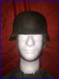 WW2 German M35 helmet in original paint. Native collection. Original