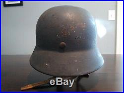 WW2 German M35 helmet with steel band and rough liner original paint LOOK