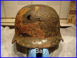 WW2 German helmet M35 SS original. Relic. Entourage