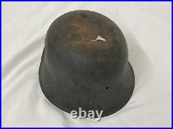WW2 Original German Army M-42 Battle Damaged Field Pickup Helmet. Large Size 68