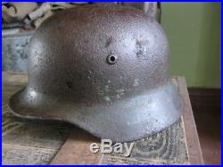 WW2 WWII German Wehrmacht helmet from Kurland. Battlefield damaged