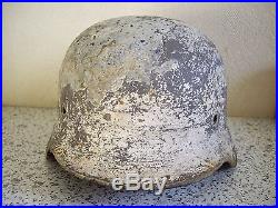 WW2 original German helmet M40. Winter camo. Relic