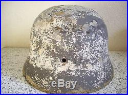 WW2 original German helmet M40. Winter camo. Relic