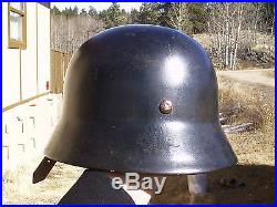 W. W. 2 German Helmet M 40 Rolled Edge Black With Liner And Chin Strap Dated