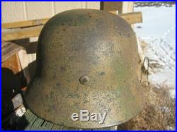 W. W. 2 German M-1935 Combat Helmet With Liner And Camo Paint