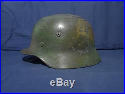 Ww2 German M-35 3 color camouflage helmet. Name inside. Size 64. Complete