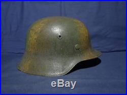 Ww2 German M-35 3 color camouflage helmet. Named. Size 64. Complete