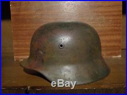 Ww2 German M-40 helmet. Size 64. 3-color camo. With liner. Name inside