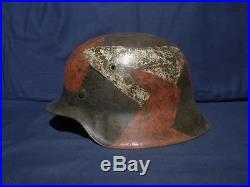 Ww2 German M-42 3 color camouflage helmet. Size 62. With initials. Complete