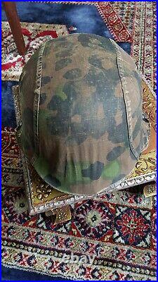 Ww2 German camouflaged helmet cover well worn condition