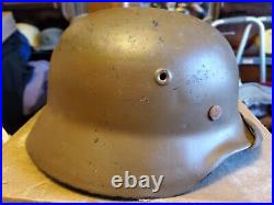 Ww2 german m40 helmet with liner and chinstrap makers mark EF62